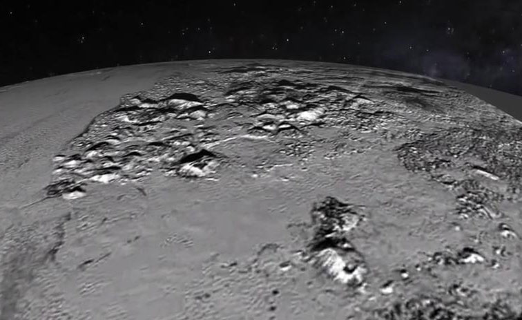 Video of New Horizons’ Flyover of Pluto’s Icy Mountain and Plains