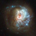 Hubble Views a Starburst Galaxy Hubble Views a Swirl of Star Formation