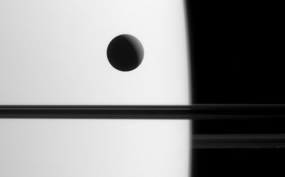 Entranced by a Transit – Cassini Views Dione as it Crosses the Face of Saturn