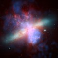 Matter blasts out of the starburst galaxy M82