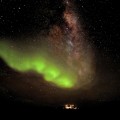 green glow of Aurora Australis high over Concordia station