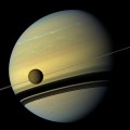 natural color view of Titan and Saturn from NASA's Cassini spacecraft