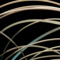 new fiber developed by Yoel Fink's group emits blue laser light only at a precisely controlled location