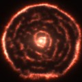 unexpected spiral structure in the material around the old star R Sculptoris