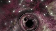 A 31.5 Solar Mass Black Hole With an 8.38 Solar Mass Black Hole Companion Viewed in Front of Its Stellar Nursery Prior to Merging
