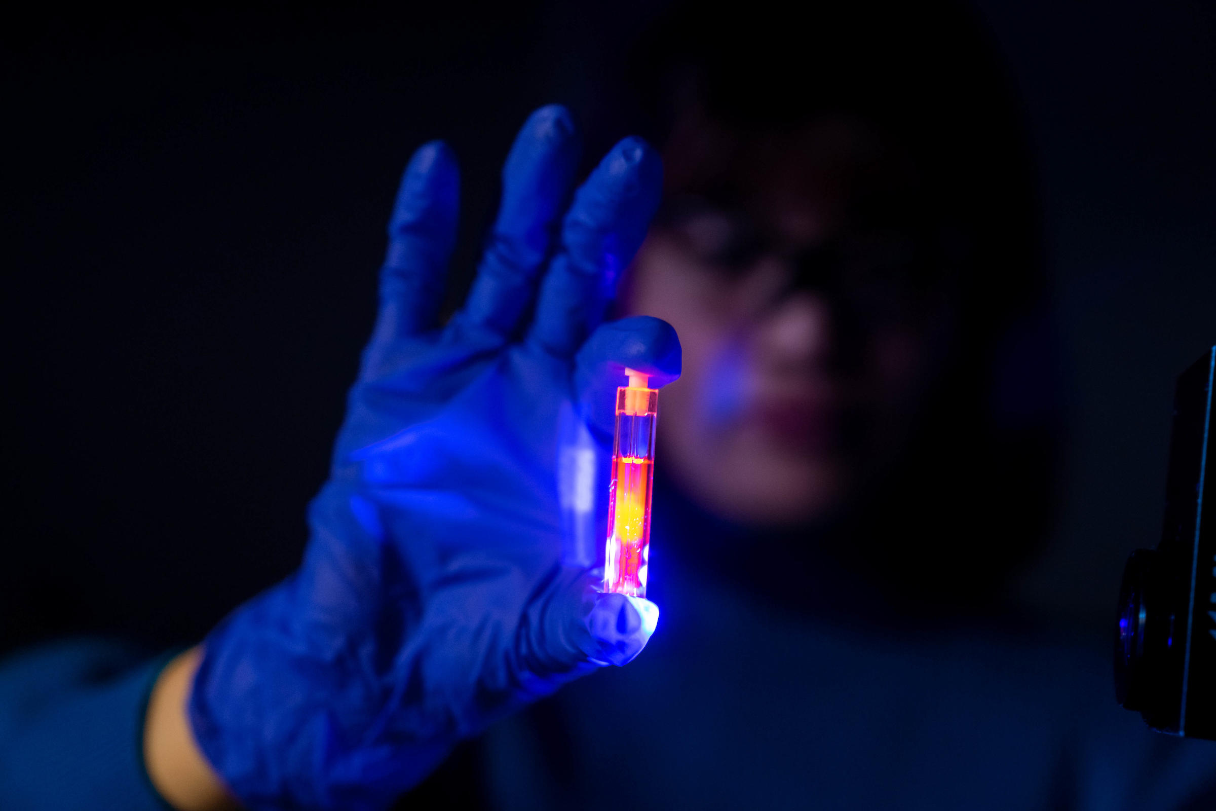 A Vial of Fluorescent Dye Molecules in Solution