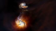 ALMA Discovers Pair of Exceptionally Rare Hyper-Luminous Galaxies