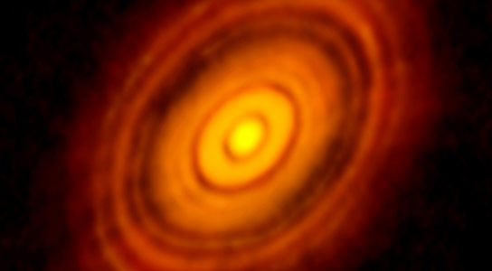 ALMA Views Planet Formation Around an Infant Star