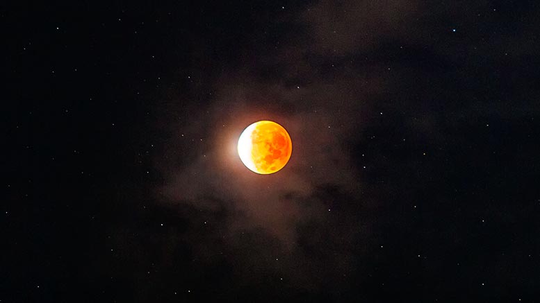 Stunning Telephoto Snapshot of an Almost Total Lunar Eclipse - SciTechDaily