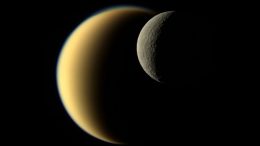 Amazing Cassini Image of Rhea Passing in Front of Titan