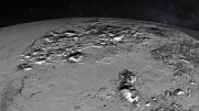 Animated New Horizons Flyover of Pluto’s Icy Mountain and Plains