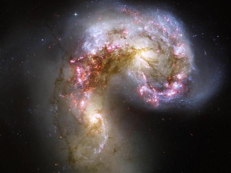 Antennae galaxy shows a multitude of bright young stellar clusters