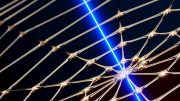Artificial Spider Web Probed With Laser Light