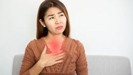 Asian Woman Heartburn