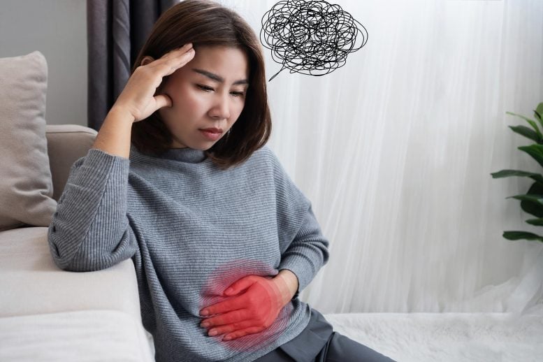Asian Woman Suffering From Nervous Stomach