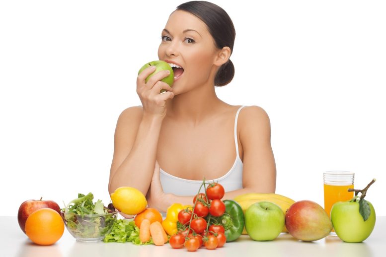 Assorted Fruit Woman Eating Apple