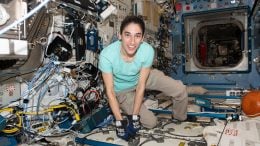 Astronaut Jasmin Moghbeli Opens Science Freezer That Hosts Research Samples