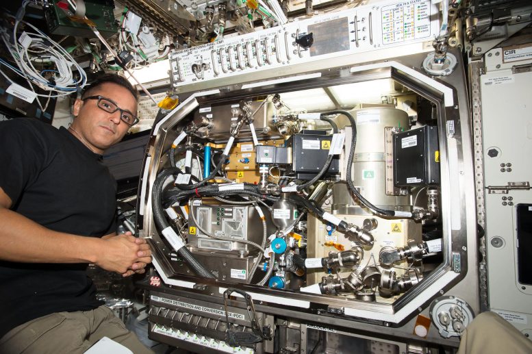 Astronaut Joseph Acaba Installing ZBOT Hardware