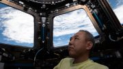 Astronaut Satoshi Furukawa Peers at Earth From Inside Cupola
