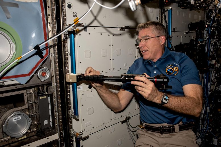 Astronaut Stephen Bowen Installs Student-Made Hardware