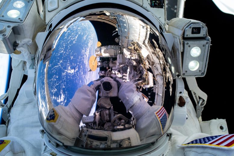 Astronaut Suni Williams' Camera Reflected Spacesuit Helmet