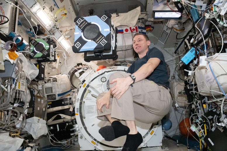 Astronaut Woody Hoburg Monitors Astrobee Robotic Free-Flyer