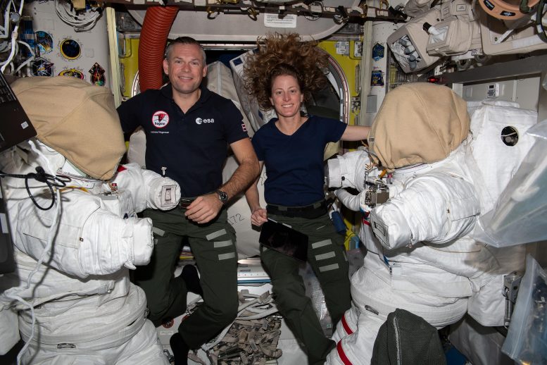 Astronauts Andreas Mogensen and Loral O’Hara Work on Spacesuits