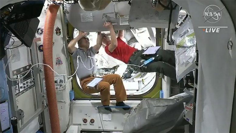 Astronauts Koichi Wakata and Nicole Mann Close Hatch