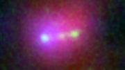 Astronomers View the Merger of Three Young Galaxies