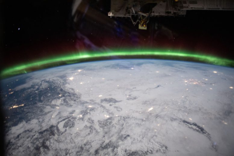 Aurora Glows Above Earth