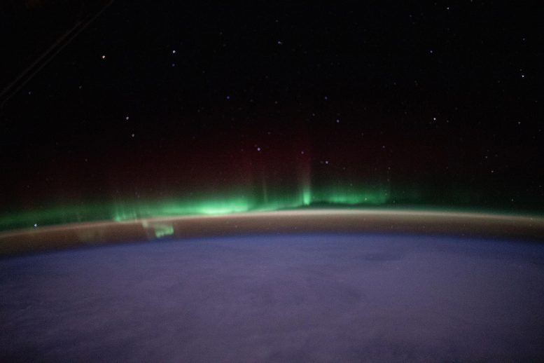 Aurora in Night Sky From Space Station