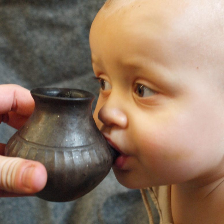 Baby Feeding from Reconstructed Infant Feeding Vessel