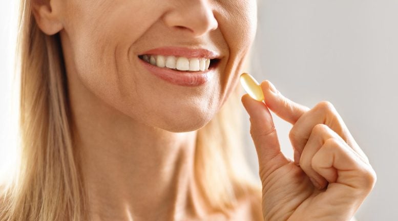 Beauty Supplements. Closeup Smiling Woman