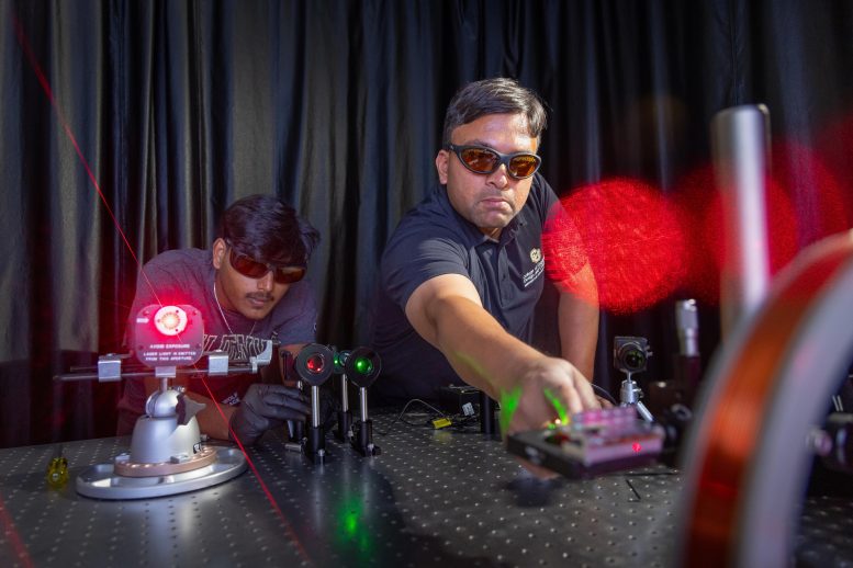 CU Denver Team Conducting Laser Experiment