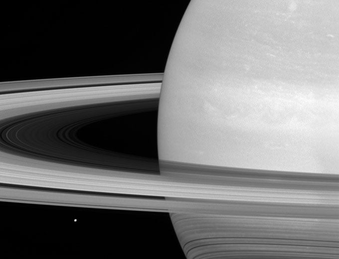 Cassini Sees Tiny Mimas Huge Rings