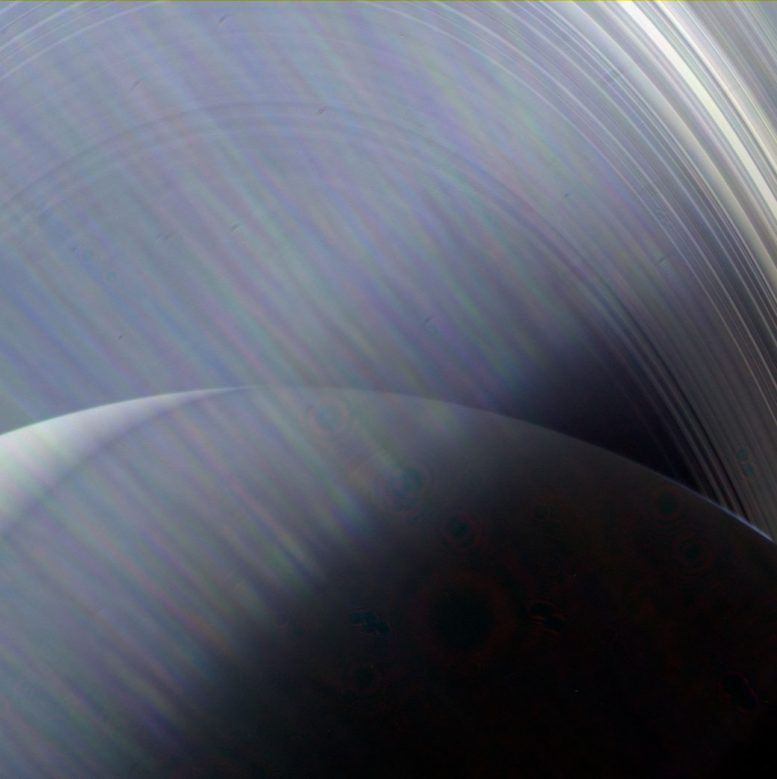Cassini Spacecraft Sees Saturn and Its Rings Through a Haze of Sun Glare