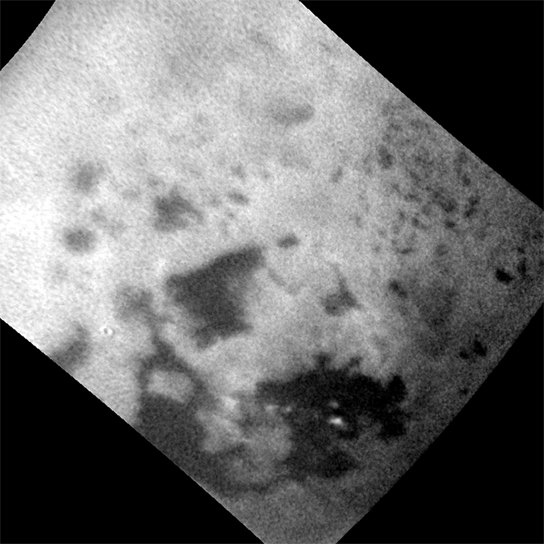 Cassini Tracks Clouds Developing Over a Sea on Titan