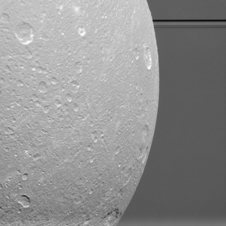 Cassini Views Dione Before the Rings