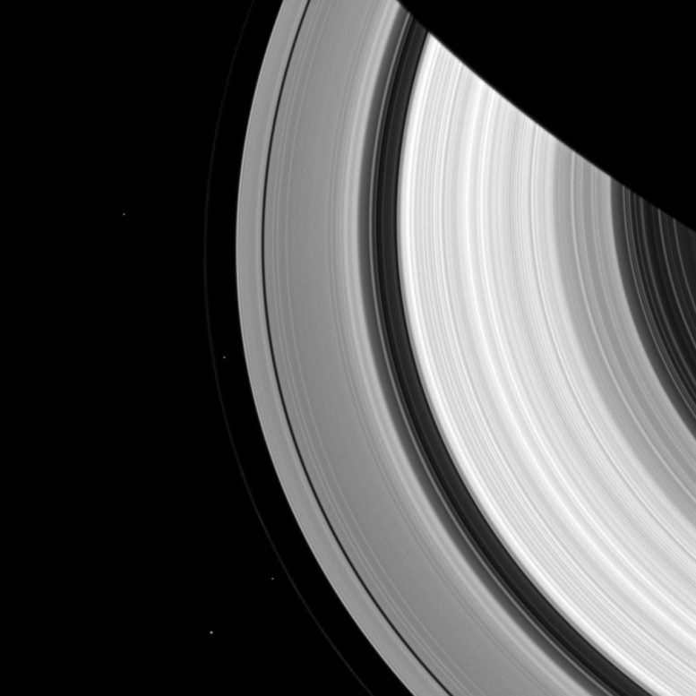 Cassini Views Four Moons of Saturn
