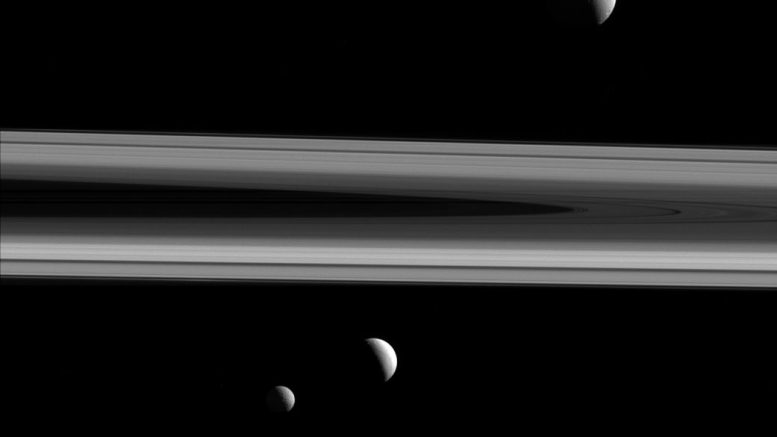 Cassini Views Saturn's Moons Enceladus and Tethys