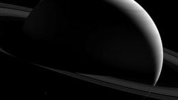 Cassini Views the Night Sides of Saturn and Tethys