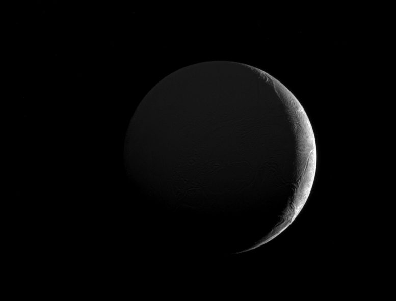 Cassini Views the Slim Crescent of Saturn's Moon Enceladus 