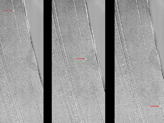Cassini images show a propeller-shaped structure created by an unseen moon in Saturn's A ring