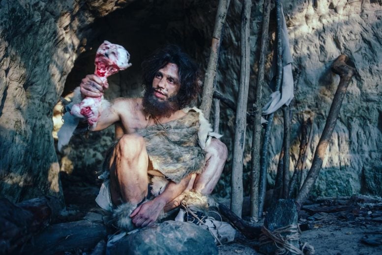 Caveman Holding Meat Bone