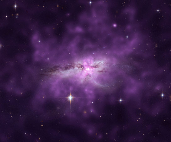 Chandra Reveals Shock Heated Gas in Colliding Galaxies NGC6240