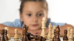 Child Girl Playing Chess