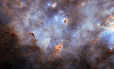 Hubble’s Dazzling Portrait of Baby Stars Lighting Up a Cosmic Cloud