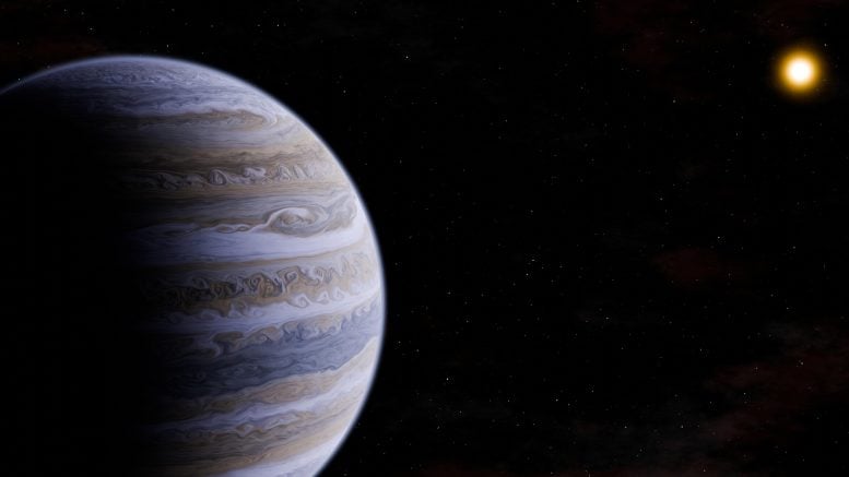 Cold Gas Giant Orbiting a Red Dwarf