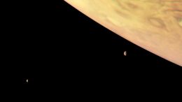 Color-Enhanced Juno Image of Jupiter and Two of Its Largest Moons