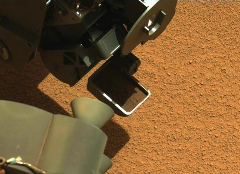 Curiosity's First Scoop of Mars